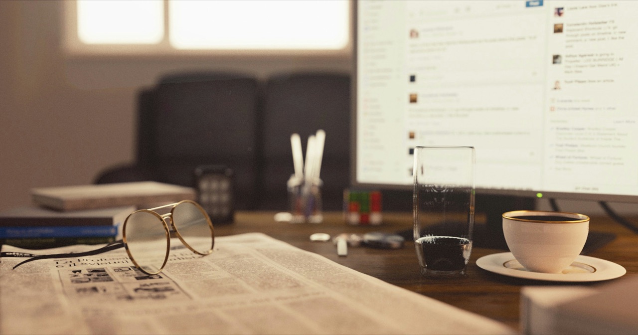 A media desk with a newspaper and screen — the next broadcast playbook
